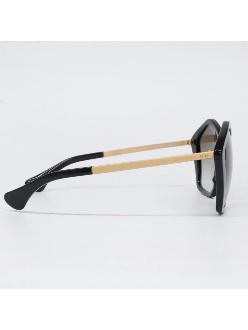 Miu Miu Pentagon Eyewear